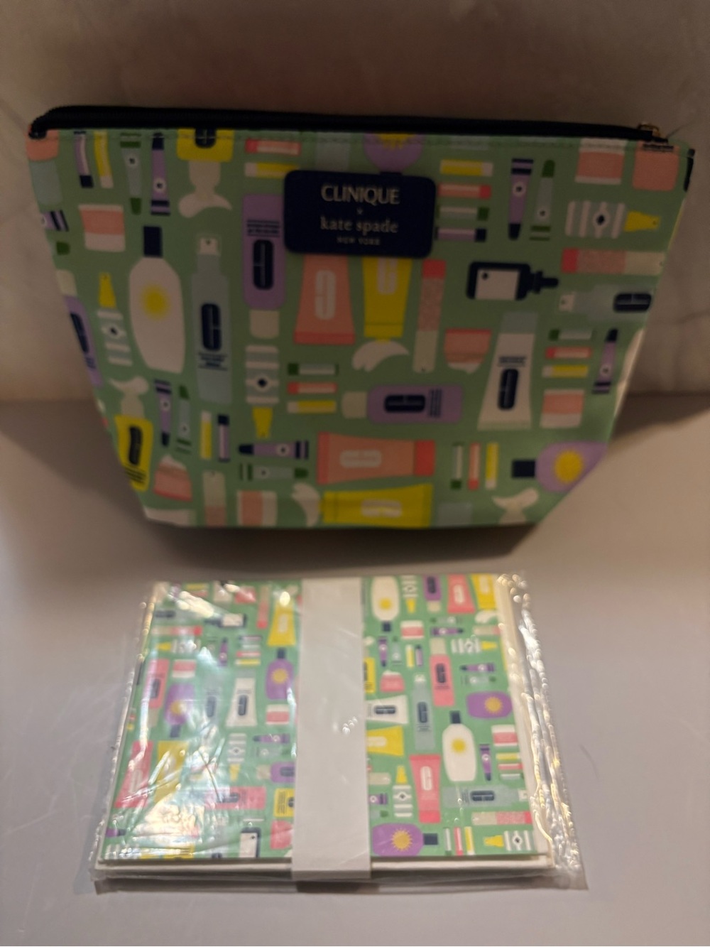 Clinique Mint Green Cosmetic Pouch with Pastel Toiletry Print